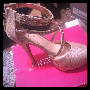Gold high heels